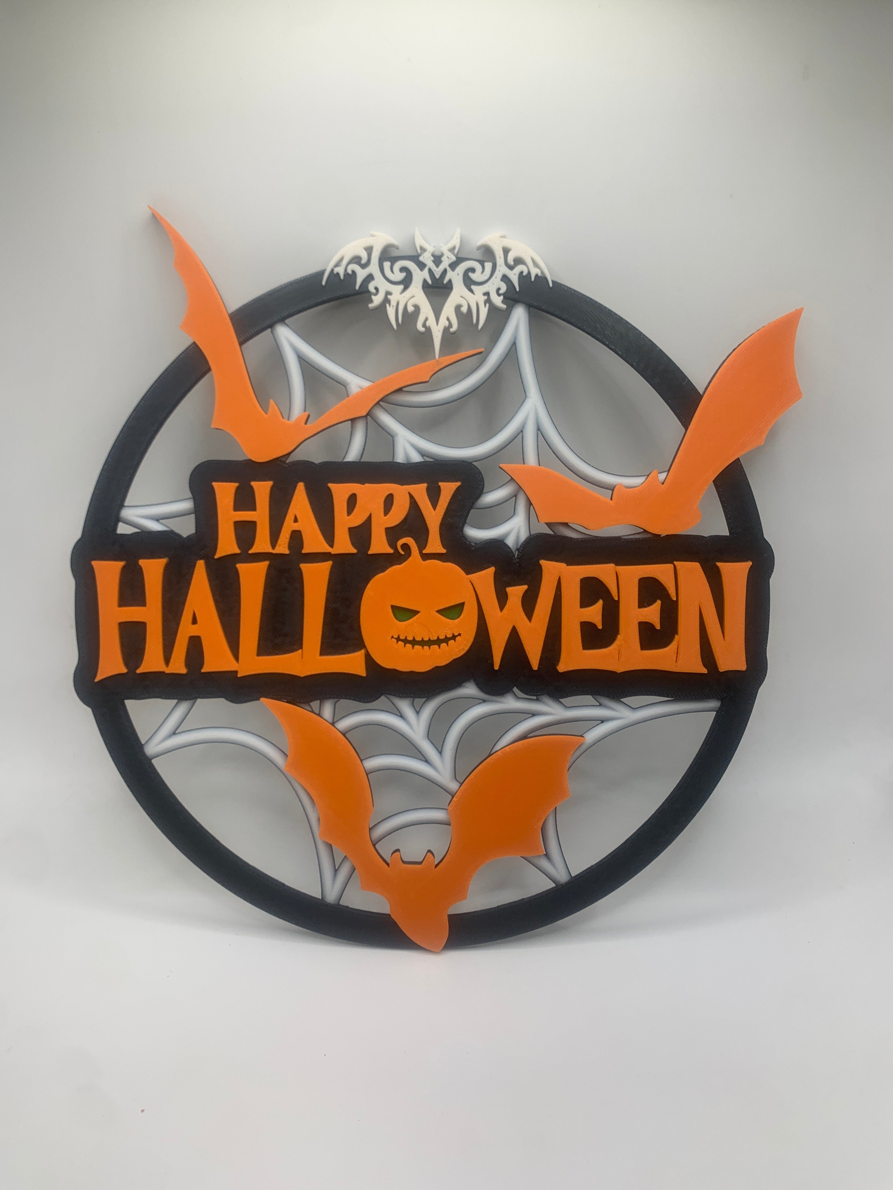 Round Happy Halloween Sign w/ Bat and pumpkin design.